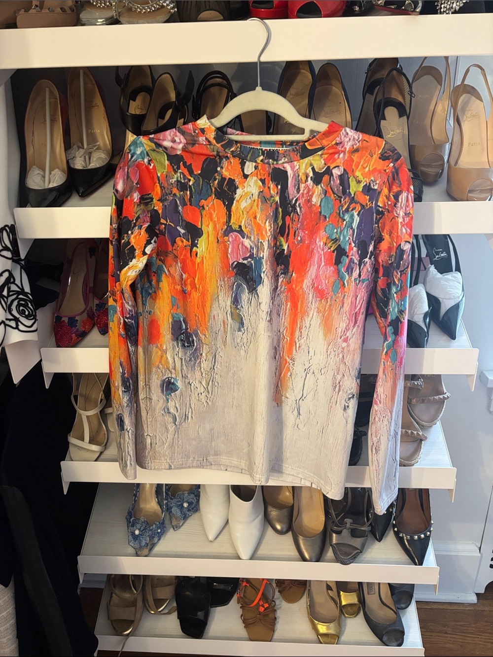 Exclusive long sleeve multi color top.